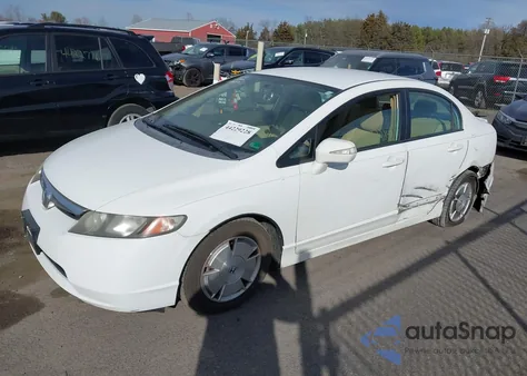 2007 Honda Civic Hybrid from USA, damaged, VIN JHMFA362X7S027236
